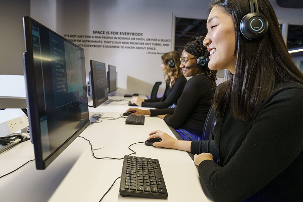 Young female students in mission control